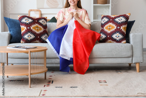 Young woman with flag of Fr...