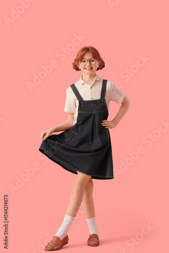 Cute ginger girl in stylish...