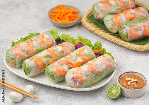 Gỏi cuốn, Vietnamese spring rolls, summer spring rolls, or salad spring rolls, a traditional dish in Vietnamese cuisine consisting of chicken, shrimp, vegetables, bún, and other ingredients wrapped in