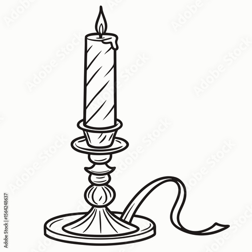 Ornate candlestick with burning candle flame light