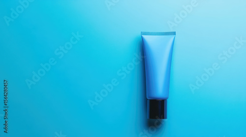 Wallpaper Mural Blue cosmetic tube on vibrant background Torontodigital.ca