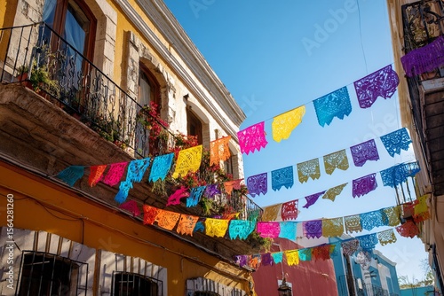Colorful paper flags and garlands hanging in the air