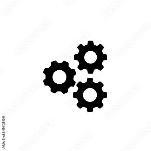 Black icon of four mechanical gears symbolizing industrial machinery, teamwork, or engineering systems.