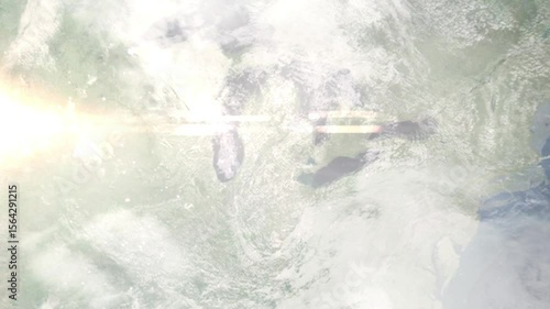 Earth zoom in from space and focus on Lansing, Michigan, USA. Background for travel intro or blog. Satellite view. 3D style Animation. Images from NASA.