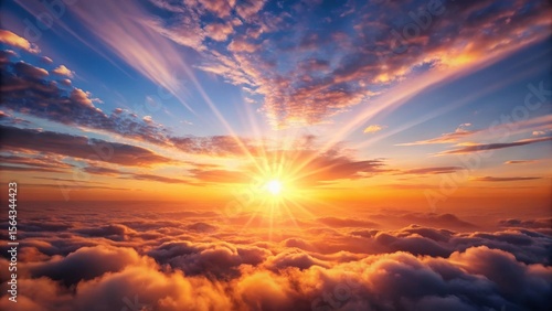 A majestic sun rises above the horizon