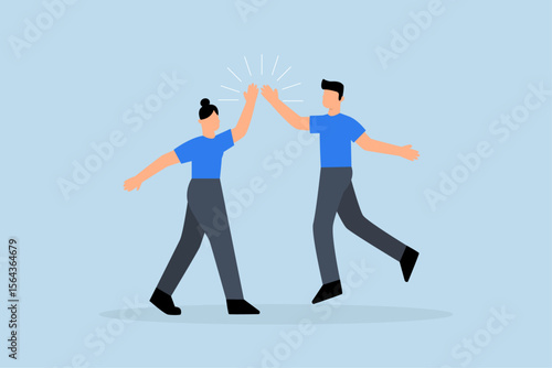 happy businessman and woman teamwork colleagues jumping and hi five clapping hands.