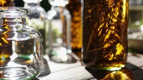 Herbal infusions and essential oils in glass bottles ai generative