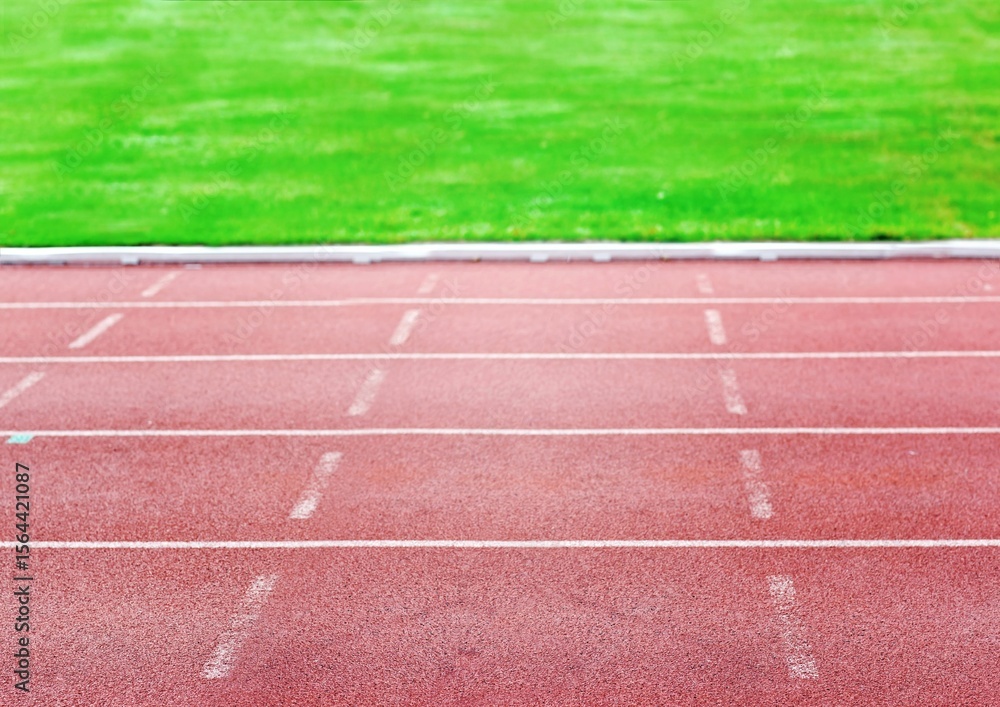 Fototapeta premium Flat design is showing red track lanes with white markings over grass field, transparent background