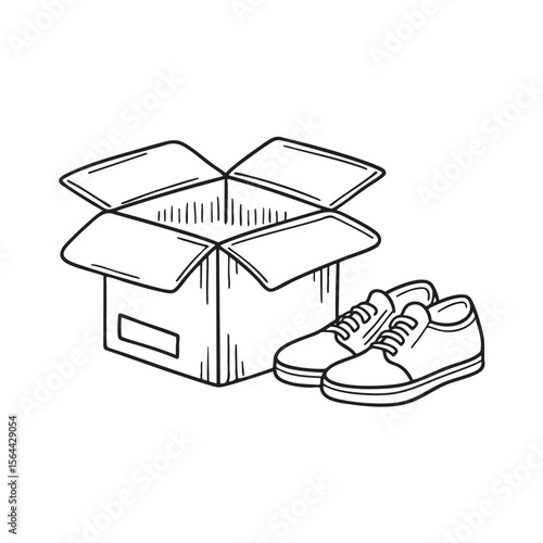 An open shoebox on the floor beside a pair of new shoes