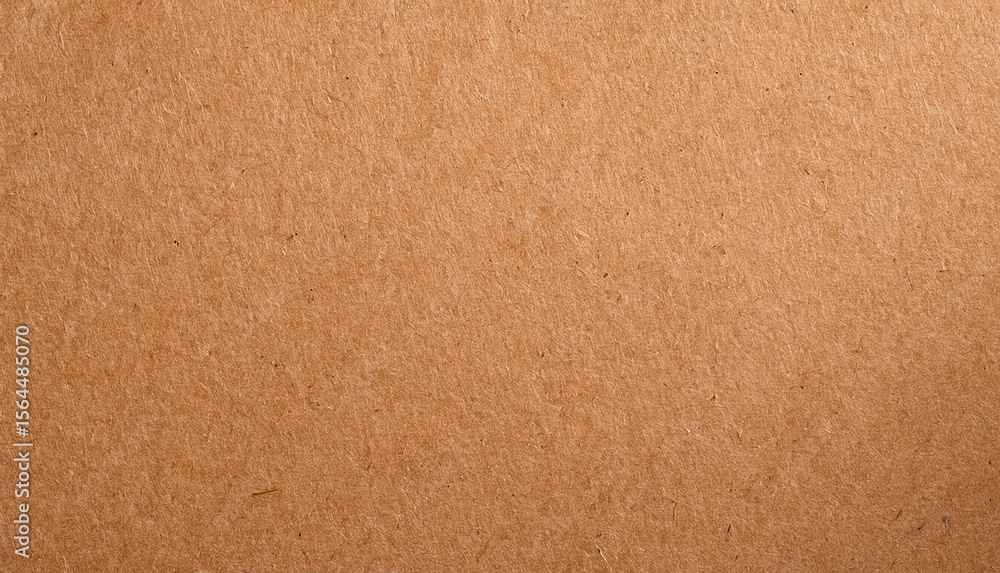 Fototapeta premium Close-up of a brown paper texture, showcasing its rough and aged surface