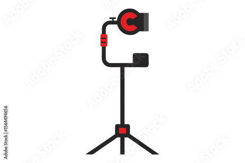 Modern black and red camera gimbal stabilizer on a tripod stand