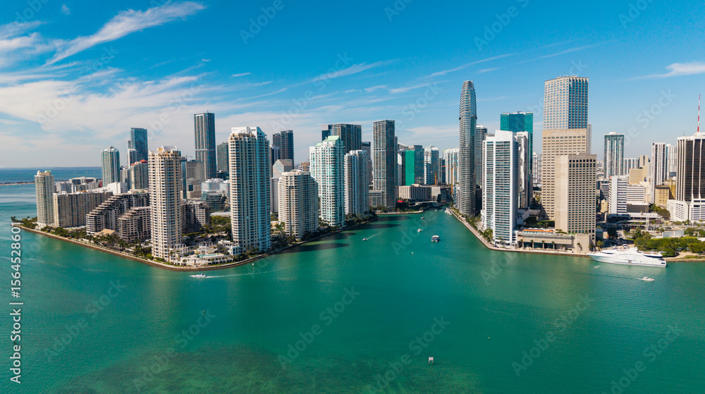 Obraz premium Panoramic modern architecture in Miami downtown, Florida. Miami skyline panoramic view. Aerial view of cityscape with skyscraper in Brickell Key, United States. Downtown Brickell Miami