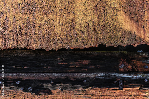 STEEL AND WOOD - Peeling paint and rust on iron
