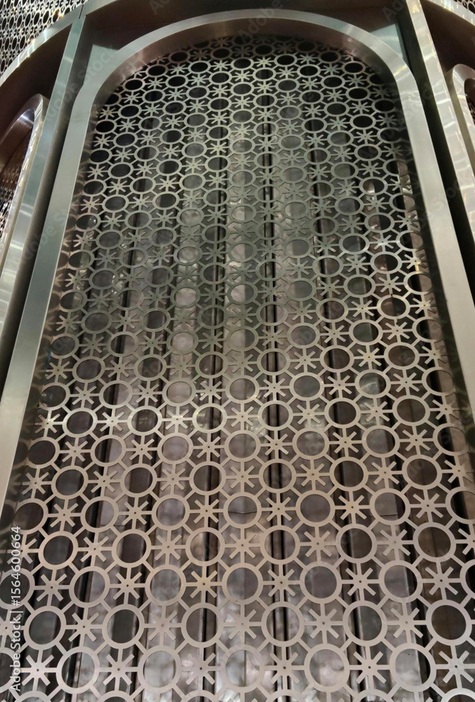 Obraz premium Metal Screen with Geometric Cutout Pattern