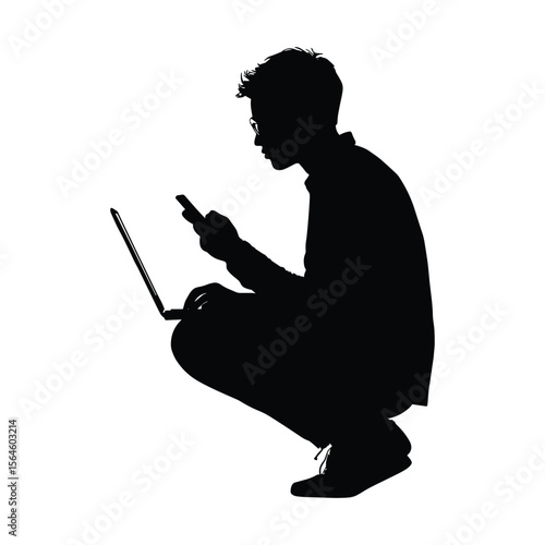 Silhouette of Person Sitting Crouched Using Laptop