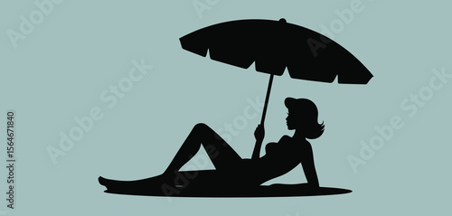 Silhouette of Woman Relaxing Under Umbrella on Beach