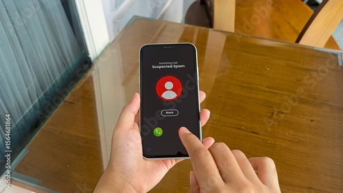 Woman Blocks Suspected Spam Phone Call