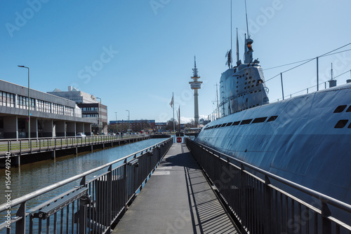 Quadro em tela A view from the gangway alongside the historic Wilhelm Bauer submarine museum, docked in the harbor of Bremerhaven, Germany