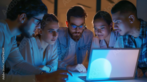 Wallpaper Mural A multicultural team working together on a laptop in a sleek Torontodigital.ca