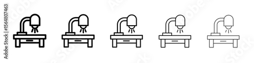 Desk with lamp icon thin line outline set or collection
