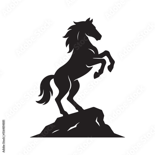 Silhouette of a rearing horse standing atop a rocky formation against white backdrop