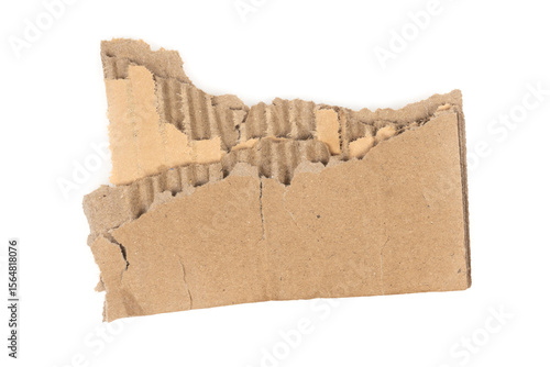 Ripped cardboard paper scraps. Piece of torn cardboard isolated on white background. damaged carton top view. Kraft paper. clipping path.