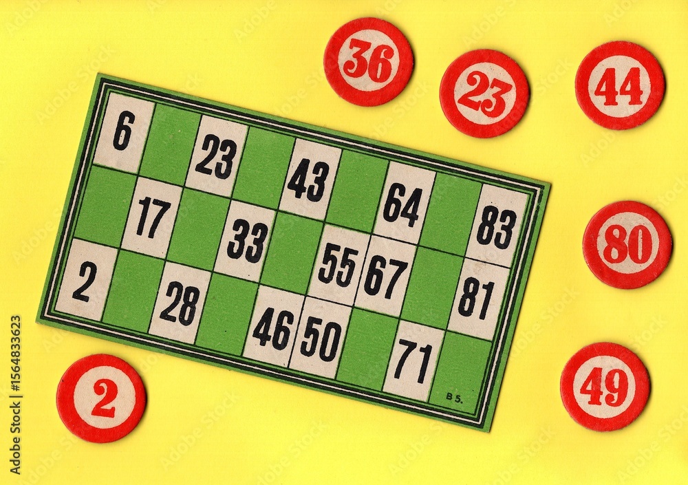 Fototapeta premium Content from the vintage game of Lotto or Bingo on a bright coloured background.