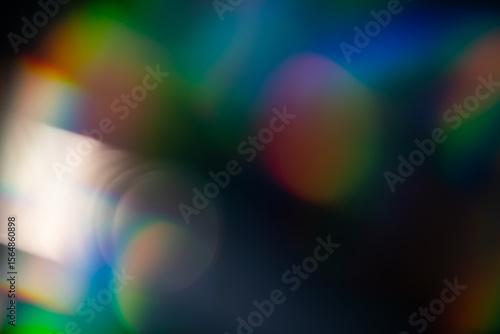 light leak overlay effect with blur rainbow light leaks,retro noisy film texture light leak flare on black background,abstract colorful background