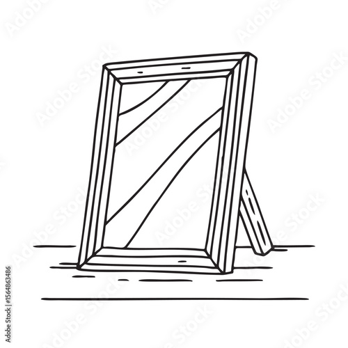 A frame resting off center against the wall