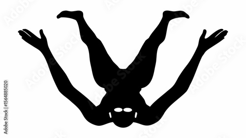 Silhouette of a person in an upside down yoga position with arms outstretched and legs in the air