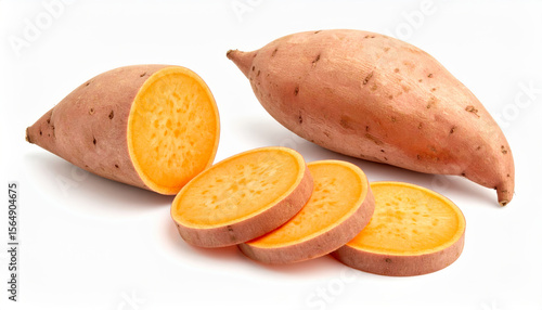 Freshly cut sweet potatoes with vibrant orange flesh on a white background