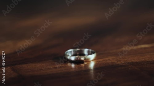 A feeling of love that fades. The woman removes wedding ring from finger. Adultery and divorce concept. High quality 4k footage