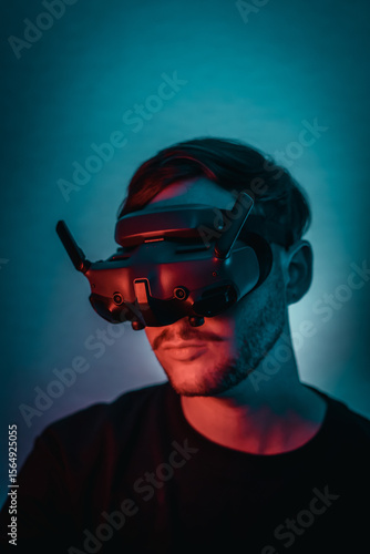 Man Wearing Drone FPV Headset In Beautiful Moody Lighting Drone Pilot