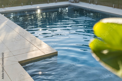 Sunlit Afternoon Pool Water Glistening in the light 