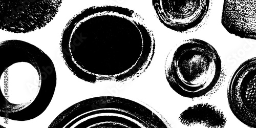 Collection of distressed dry ink stamp textures with rough edges in black for creative design