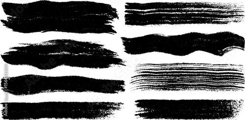 Collection of abstract dry brush stroke patterns in black ink for artistic design