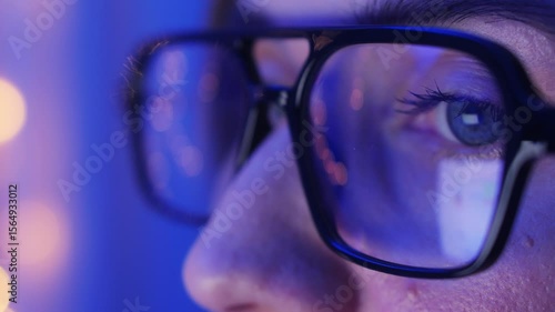 Wallpaper Mural Close-up focused face woman girl in glasses working using laptop. Reading, watching, working online late. High quality 4k footage Torontodigital.ca