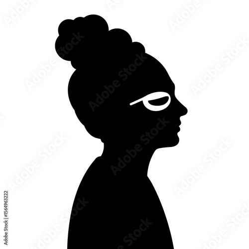 Silhouette of a woman with a bun and stylish glasses in profile  