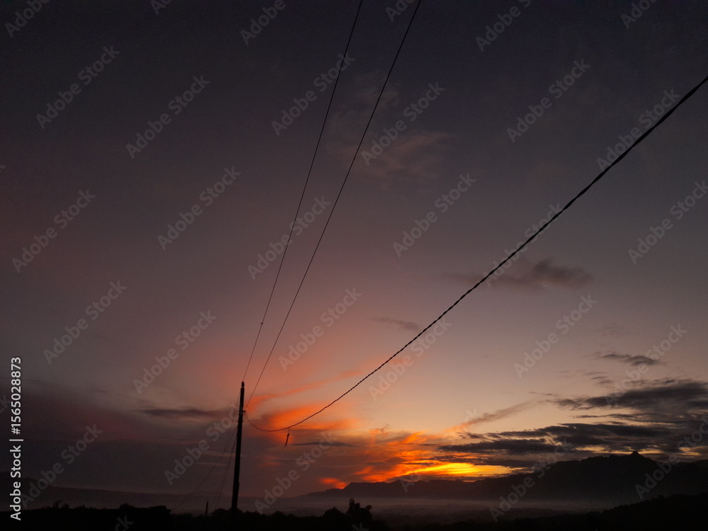 Obraz premium photo of sillhouette power line