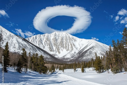 Lenticular Cloud Halo Over Snow-Capped Mountain Peak in Colorado, USA