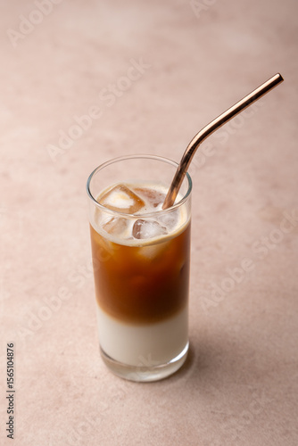 Wallpaper Mural Coffee with coconut milk and ice cubes in a tall glass. Traditional non-alcoholic cold drink. In the background, a jar of coffee and a jar of sugar. Selective focus, close-up. Torontodigital.ca