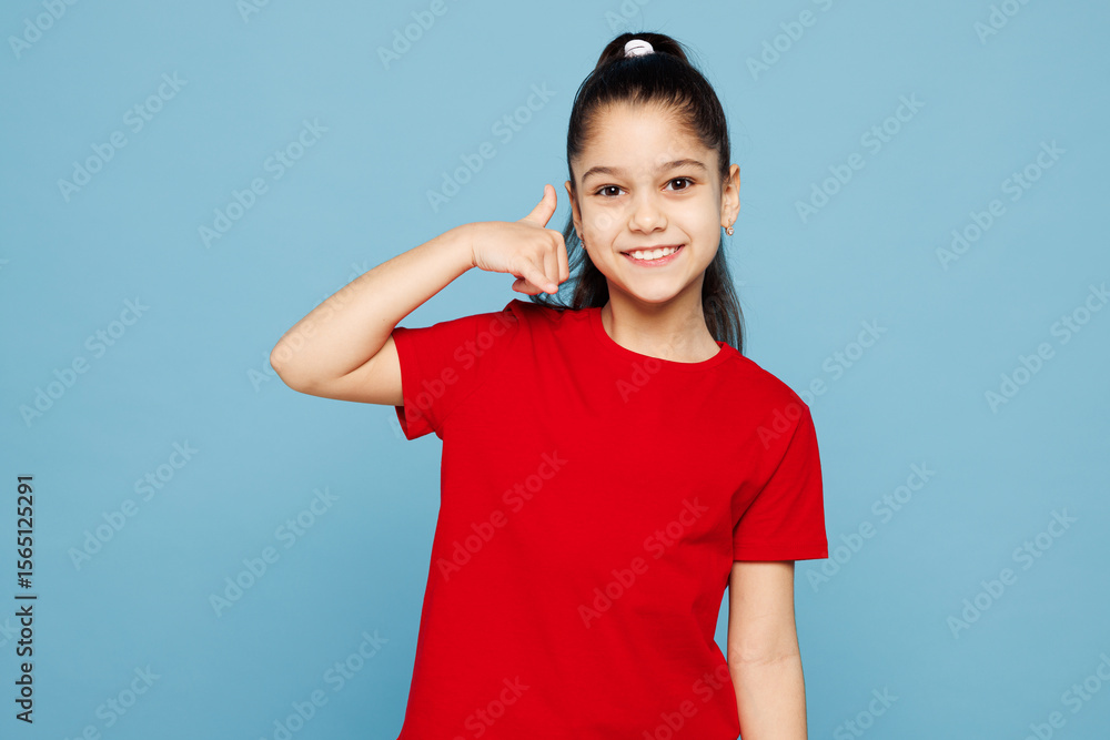Little child kid girl 8-9 years old wears red t-shirt have fun doing phone gesture like says call me back isolated on pastel light blue background studio. Mother's Day love family lifestyle concept. Little child kid girl 8-9 years old wears red t-shirt have fun doing phone gesture like says call me back isolated on pastel light blue background studio. Mother's Day love family lifestyle concept.