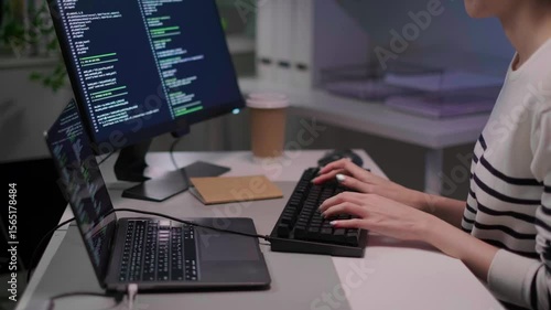 Close-up woman hand typing on keyboard software technology cyberspace programmer coding laptop working internet network online