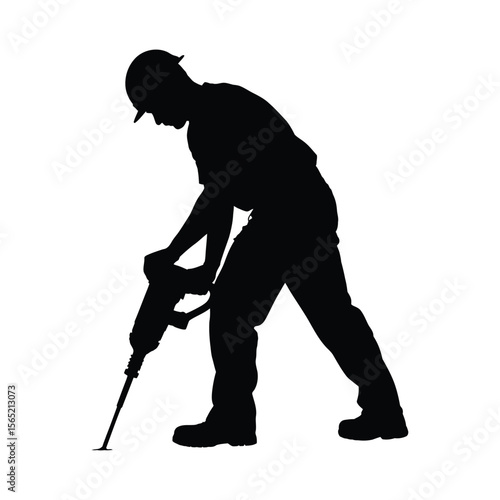 Construction worker silhouette operating a jackhammer on white background silhouette isolated on white background