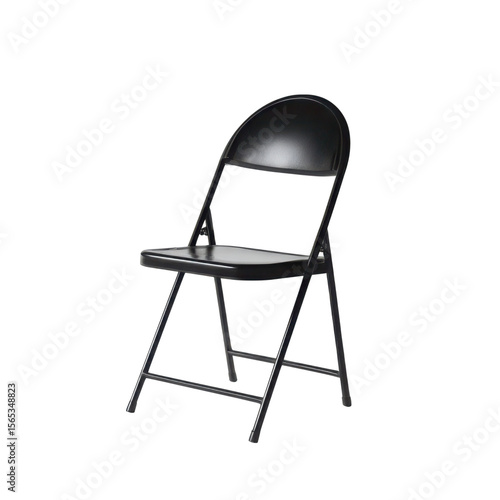 A single black folding chair centered on a stark white background in studio light