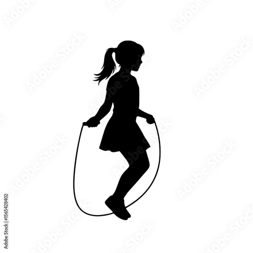Silhouette of a young girl joyfully jumping rope during outdoor activity
