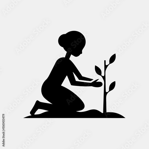woman planting a tree