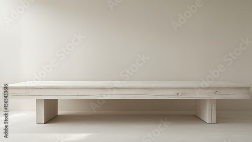 Wallpaper Mural Minimalist White Wooden Table Against Beige Wall image Torontodigital.ca