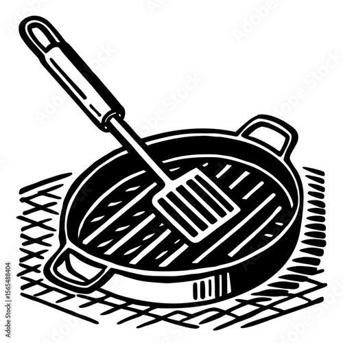 Black grill pan and spatula on white background cooking kitchenware