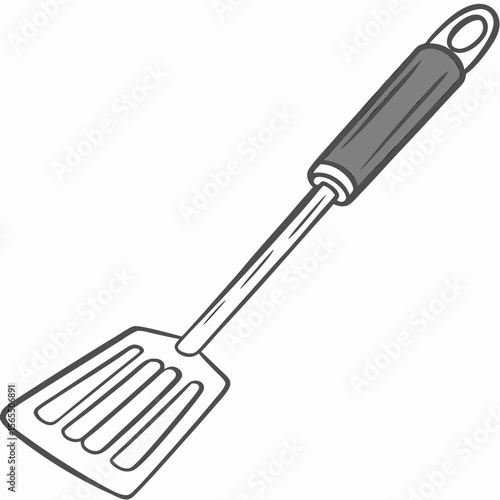 Gray handled slotted spatula kitchen utensil cooking